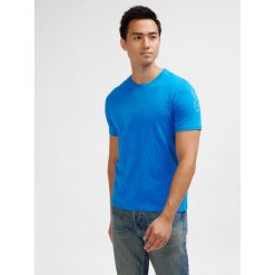 Koszulka w jodełkę Hummel Elemental. Niebieskie koszulki sportowe męskie Hummel, bez wzorów, bez kołnierzyka, bez ramiączek, do piłki nożnej. Za 117.50 zł.