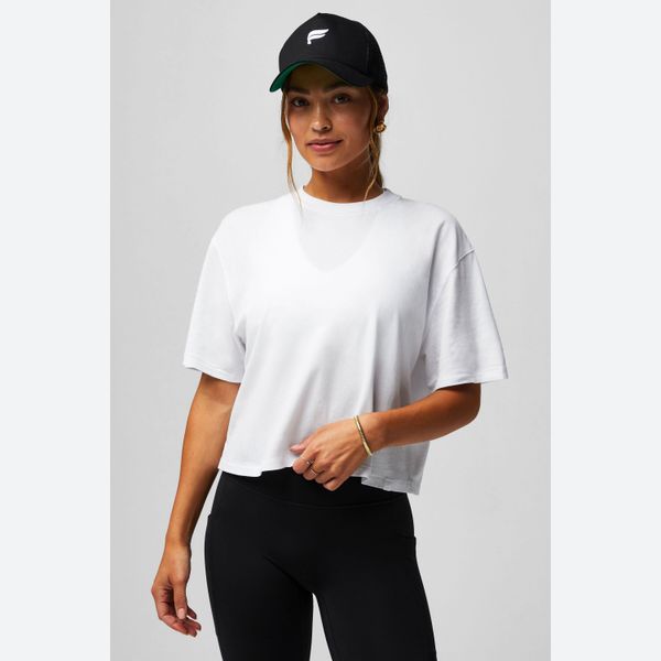 Koszulka damska Fabletics Boxy. Czarne koszulki sportowe damskie FABLETICS, xl, bez wzorów, z bawełny, eleganckie, bez kołnierzyka. Za 179.00 zł.