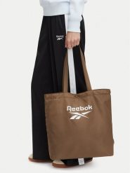 Reebok Torebka CWBEO-RBK-M-012-10 Brązowy. Brązowe torebki do ręki damskie Reebok, bez wzorów, z materiału, bez dodatków. Za 69.99 zł.