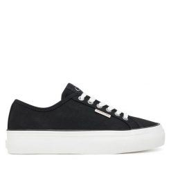 Tenisówki Calvin Klein Jeans. Czarne trampki i tenisówki damskie Calvin Klein Jeans, bez wzorów, z jeansu, bez zapięcia. Za 209.99 zł.