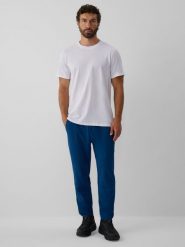 4F Spodnie dresowe z technicznej dzianiny męskie - turkusowe M. Niebieskie spodnie sportowe męskie 4f, m, bez wzorów, z dresówki. Za 189.99 zł.