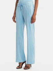 Juicy Couture Spodnie dresowe Tina JCWBJ126327 Błękitny Straight Leg. Niebieskie spodnie dresowe damskie Juicy Couture, xs, bez wzorów, z dresówki. Za 399.99 zł.