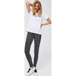 Legginsy w kratkę. Legginsy damskie MOODO, s, bez wzorów. Za 9.99 zł.