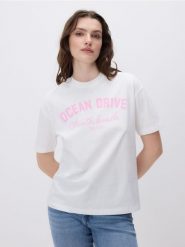 T-shirt z nadrukiem - złamana biel. T-shirty damskie Reserved, l, bez wzorów, z bawełny, bez kołnierzyka. Za 49.99 zł.