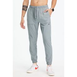 Spodnie do biegania Fabletics The One. Szare spodnie sportowe męskie FABLETICS, m, bez wzorów, z dresówki, do biegania. Za 359.35 zł.