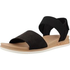 Sandały SKECHERS 114710S Czarny. Czarne sandały damskie Skechers, bez wzorów, z materiału, bez obcasa, bez zapięcia. Za 159.99 zł.