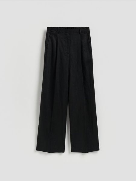 Lniane spodnie - czarny. Czarne spodnie materiałowe damskie Reserved, l, bez wzorów. Za 239.99 zł.