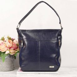 Torebka damska granatowa DAN-A T452. Torebki do ręki damskie DAN-A, bez wzorów, ze skóry, bez dodatków. Za 329.99 zł.