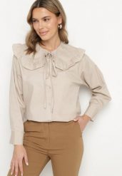 Beżowa Bawełniana Koszula Retro z Ozdobnym Kołnierzykiem i Wiązaniem Ravselina. Brązowe bluzki damskie Born2be, uniwersalny, bez wzorów, z bawełny, eleganckie, bez kołnierzyka, bez ramiączek. Za 99.99 zł.
