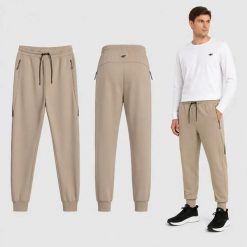 SPODNIE MĘSKIE SPORTOWE 4F JOGGERY DRESOWE BEŻOWE. Brązowe spodnie sportowe męskie 4f, m, bez wzorów, z dresówki, na fitness i siłownię. Za 159.99 zł.