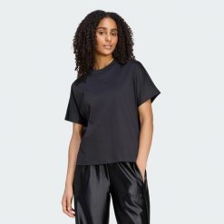 LUŹNA KOSZULKA SOFT LUX. Czarne t-shirty damskie Adidas, xl, bez wzorów, z bawełny, klasyczne, bez kołnierzyka. Za 199.00 zł.