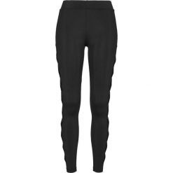 Damskie klasyczne legginsy miejskie w prążki. Czarne legginsy sportowe damskie Urban Classics, bez wzorów. Za 160.50 zł.