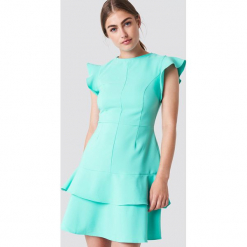 Trendyol Sukienka mini z falbankami na ramionach - Turquoise. Zielone sukienki damskie Trendyol, z dekoltem na plecach. W wyprzedaży za 56.78 zł.