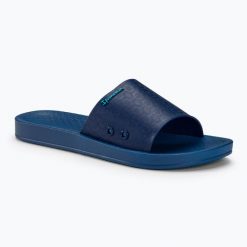 Klapki damskie Ipanema Anat Classic. Niebieskie klapki damskie Ipanema, bez wzorów, z materiału, eleganckie, bez obcasa. Za 89.99 zł.