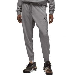 Spodnie Dri-FIT Sport Crossover Rozmiar M Szary - DQ7332-091. Szare spodnie sportowe męskie Nike, m, bez wzorów, z dzianiny, na fitness i siłownię, dri-fit (nike). Za 297.85 zł.