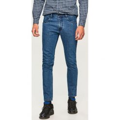 Jeansy slim fit - Niebieski. Niebieskie jeansy męskie Reserved. Za 129.99 zł.