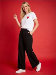 Spodnie wide leg z ozdobnym pasem - czarny. Czarne spodnie materiałowe damskie Sinsay, l, bez wzorów. Za 59.99 zł.