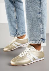 Złoto-Białe Sznurowane Sneakersy w Stylu Tenisówek Liavessa. Żółte obuwie sportowe damskie Born2be, bez wzorów, z jeansu, tenisowe. Za 84.99 zł.