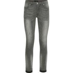 Dżinsy ze stretchem 7/8 SKINNY bonprix jasnoszary "used". Jeansy damskie marki bonprix. Za 129.99 zł.