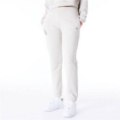 Spodnie sportowe damskie New Era 60435304. Białe spodnie dresowe damskie New Era, s, bez wzorów, z dresówki. Za 532.00 zł.