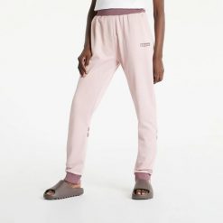 SPODNIE DAMSKIE ELLESSE SPORTOWE DRESOWE RÓŻOWE. Czerwone spodnie sportowe damskie Ellesse, m, bez wzorów, z bawełny, na fitness i siłownię. Za 195.69 zł.