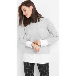 Sweter z koszulowymi wstawkami. Niebieskie swetry damskie Orsay, z bawełny, z golfem. Za 119.99 zł.