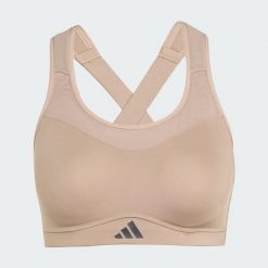 Biustonosz treningowy TLRD Impact o mocnym wsparciu. Brązowe obuwie sportowe damskie Adidas, bez wzorów, z materiału, na fitness i siłownię. W wyprzedaży za 207.20 zł.