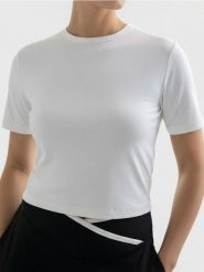 Koszulka sportowa Gym Hard - kremowy. Białe koszulki sportowe damskie Sinsay, l, bez wzorów, bez kołnierzyka, bez ramiączek. Za 19.99 zł.