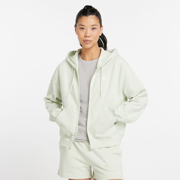 Bluza damska New Balance WJ41501NUM – miętowa. Zielone bluzy damskie New Balance, l, bez wzorów, z bawełny, z kapturem. Za 169.99 zł.