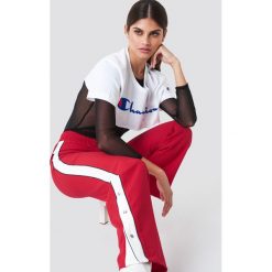 Trendyol Spodnie z zatrzaskami - Red. Spodnie materiałowe damskie marki Trendyol. Za 121.95 zł.