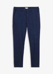 Spodnie chinosy regular fit z ciepłą podszewką flanelową, tapered. Niebieskie eleganckie spodnie męskie bonprix, m, bez wzorów. Za 189.99 zł.