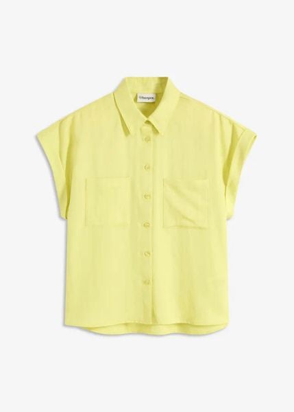 Bluzka z lejącego materiału z lyocellem. Żółte bluzki damskie bonprix, bez wzorów, z lyocellu, klasyczne, bez kołnierzyka, bez ramiączek. Za 47.99 zł.