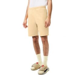 Spodenki męskie Lacoste. Żółte krótkie spodenki sportowe męskie Lacoste, m, bez wzorów, z bawełny. Za 197.00 zł.