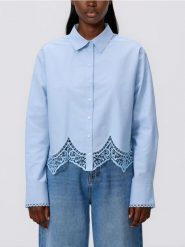 Koszula z ażurowym dołem - jasnoniebieski. Niebieskie koszule damskie Reserved, l, w ażurowe wzory, z bawełny, bez kołnierzyka, bez ramiączek. Za 139.99 zł.