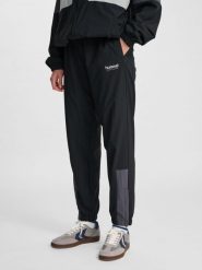 Spodnie do biegania Hummel Loose. Czarne spodnie materiałowe damskie Hummel, m, bez wzorów, z dresówki. Za 244.65 zł.