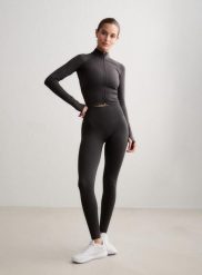 Damskie legginsy dłuższe, wysoki stan, invisible scrunch Shape Seamless szare. Szare legginsy damskie Aim'n, s, bez wzorów, z dzianiny, z podwyższonym stanem, długie, na fitness i siłownię. Za 300.00 zł.