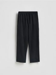Spodnie loose straight - czarny. Czarne spodnie materiałowe męskie Reserved, l, bez wzorów, z bawełny. Za 129.99 zł.