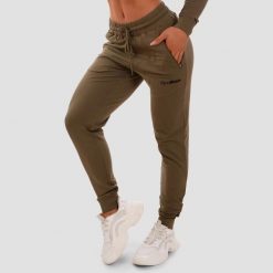Spodnie dresowe damskie fitness z kieszeniami na zamek TRN. Zielone spodnie dresowe damskie GYMBEAM, l, bez wzorów, z bawełny, do biegania. Za 123.90 zł.