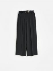 Spodnie wide leg - czarny. Czarne spodnie materiałowe damskie Reserved, l, bez wzorów, z tkaniny. Za 139.99 zł.