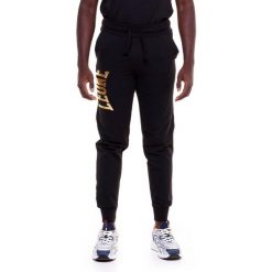 Męskie spodnie dresowe w kolorze złotym. Czarne spodnie sportowe męskie LEONE 1947 APPAREL, l, bez wzorów, z dresówki, na fitness i siłownię. Za 267.00 zł.