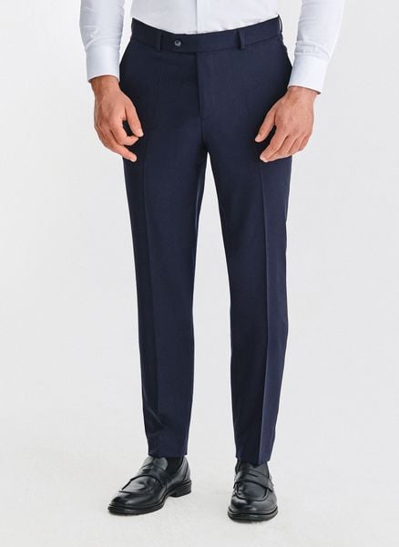 PAKO LORENTE - Wełniane granatowe spodnie garniturowe. Eleganckie spodnie męskie Pako Lorente, m, bez wzorów, z wełny, biznesowe. Za 799.99 zł.