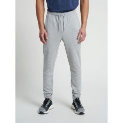 Spodnie Hummel hmlisam tapered. Szare spodnie sportowe męskie Hummel, na jesień, xl, bez wzorów, z bawełny, na fitness i siłownię. Za 208.45 zł.