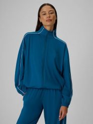 4F Bluza dresowa loose bez kaptura damska - turkusowa L. Niebieskie bluzy sportowe damskie 4f, l, bez wzorów, z dresówki, sportowe. Za 179.99 zł.
