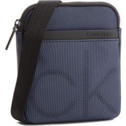Saszetka CALVIN KLEIN - Ck Point Mini Flat C K50K503875 443. Saszetki męskie marki Calvin Klein. W wyprzedaży za 249.00 zł.