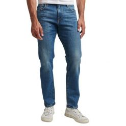 Dżinsy slim fit z bawełny organicznej Superdry. Niebieskie spodnie materiałowe męskie Superdry., m, bez wzorów, z bawełny. W wyprzedaży za 387.50 zł.