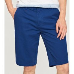 Szorty chino - Granatowy. Niebieskie spodnie materiałowe męskie Reserved, m, bez wzorów. W wyprzedaży za 59.99 zł.