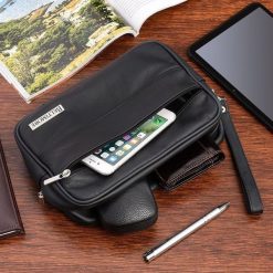 Czarna skórzana saszetka męska do ręki Beltimore R09. Czarne saszetki męskie . Za 99.90 zł.