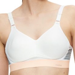 Stanik do biegania Hybrid Lite z wysoki poziomem podtrzymywania. Białe biustonosze TRIACTION, bez wzorów, z bawełny. Za 311.00 zł.