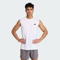 KOSZULKA BEZ RĘKAWÓW WORKOUT ESSENTIALS FEELREADY. Białe koszulki sportowe męskie Adidas, l, bez wzorów, z bawełny, bez kołnierzyka, bez ramiączek, na fitness i siłownię, climacool (adidas). Za 109.00 zł.
