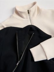 Rozpinana bluza z modalem - kremowy. Białe bluzy damskie Reserved, l, bez wzorów, z dzianiny, bez kaptura. Za 119.99 zł.